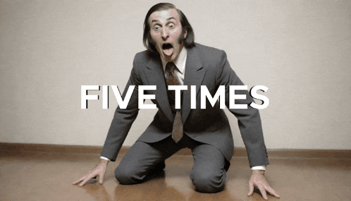 a man in a suit and tie is kneeling on the floor with the words five times above him