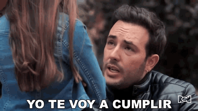 a man kneeling down next to a woman with the words yo te voy a cumplir written below him