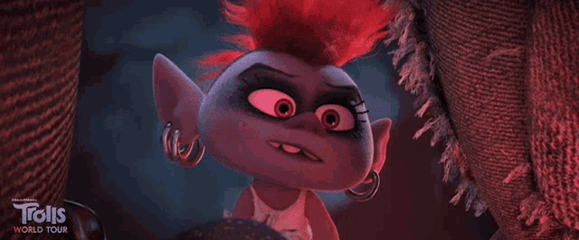 a troll from the trolls world tour is looking at the camera