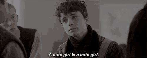 a black and white photo of a boy with the words `` a cute girl is a cute girl '' written on it .