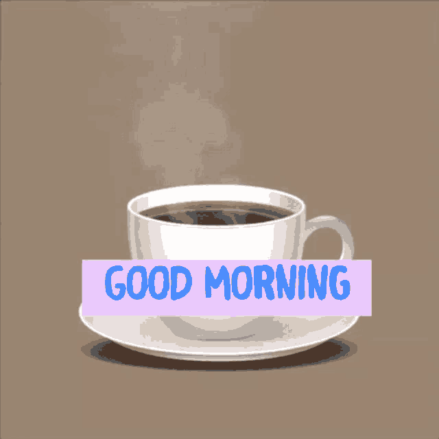 a cup of coffee on a saucer with the words good morning