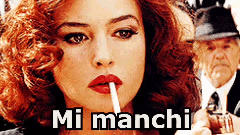 a woman with red lips is smoking a cigarette and the words mi manchi are above her