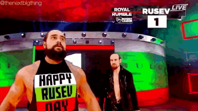 a man wearing a shirt that says happy ruseu day is walking on a stage