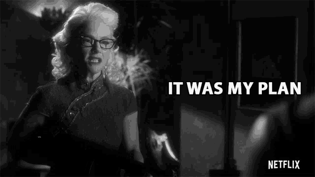 a black and white photo of a woman with the words it was my plan below her