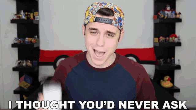 a young man wearing a hat says i thought you d never ask
