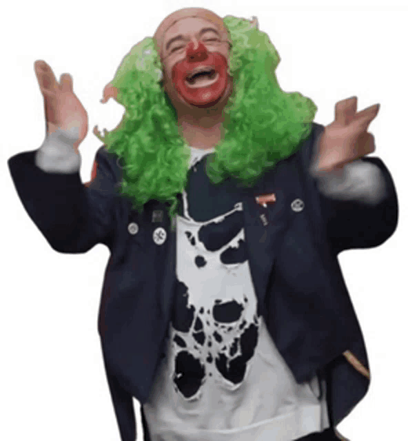 a man dressed as a clown with green wig and red nose