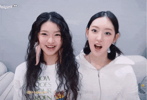 two girls wearing shirts that say how does your garden