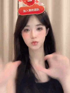 a woman wearing a headband with a red sign that says ' 加入 我 的 团队 '