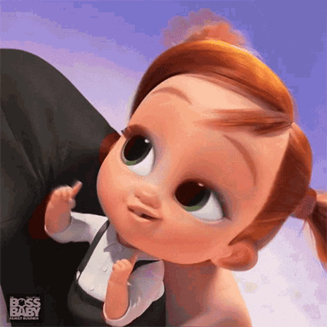 a little girl from the boss baby family business is being held by a man .