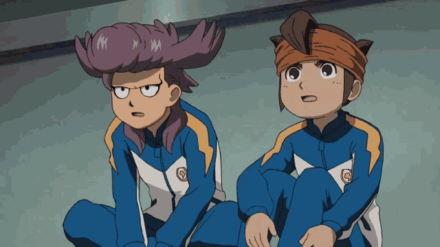 two cartoon characters one with a mohawk and the other with a bandana on their head
