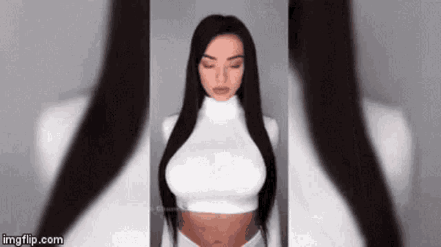 a woman with long black hair is wearing a white turtleneck crop top .