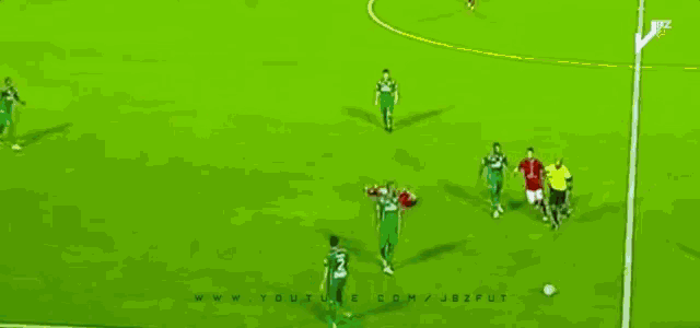 a group of soccer players are on a field with the words eu depois de tomar um cartão vermelho na vida in the corner
