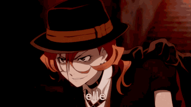 a close up of a person wearing a hat with the word elle in the corner