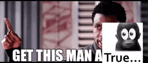 a man is pointing at a picture of a gorilla and says get this man a true ..