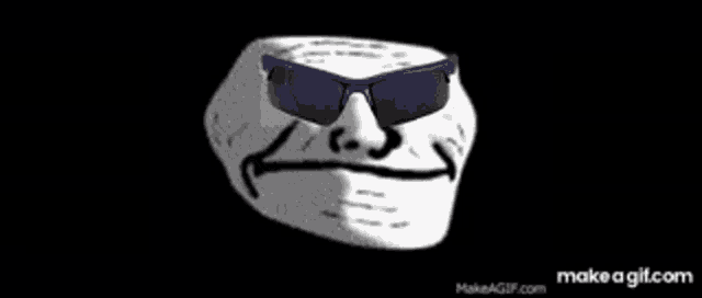 a troll face with sunglasses on a black background .