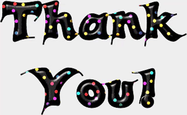 a black thank you sign with colorful polka dots on it