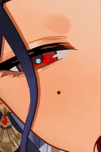 a close up of a cartoon character 's eye with a red pupil