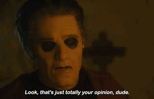 a man with a mask on his face is saying `` look , that 's just totally your opinion , dude . ``