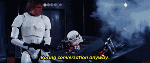 a storm trooper says boring conversation anyway while standing next to a broken storm trooper helmet .