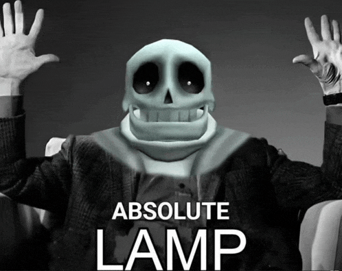 a black and white photo of a skeleton with the words absolute lamp below him
