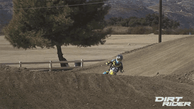 a dirt rider poster with a person on a bike