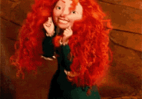 a doll with red hair is holding a microphone and smiling .