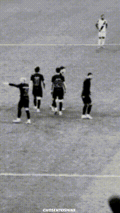 a black and white photo of soccer players with chosentoshine written on the bottom right