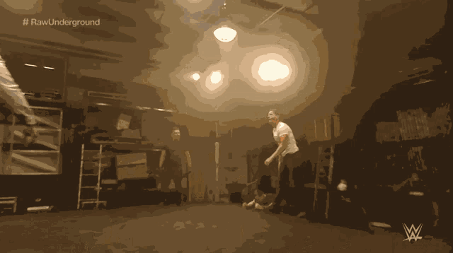 a man in a white shirt is standing in a dark room with the words raw underground written on the bottom