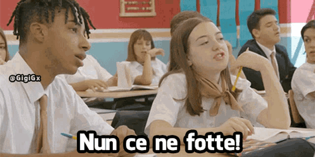a group of people in a classroom with the words nun ce ne fotte written on the bottom