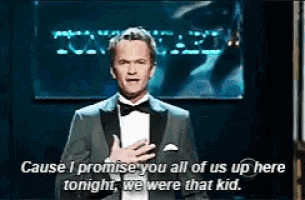 a man in a tuxedo is saying cause i promise you all of us up here tonight