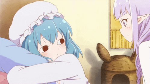 a girl with blue hair is looking at another girl