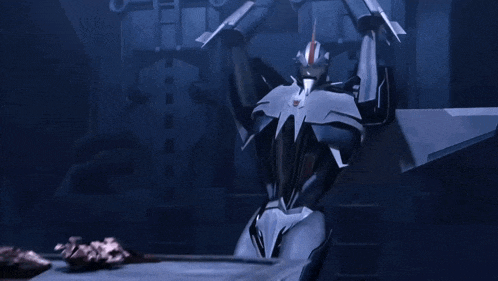 a robot is holding a rocket in his hands