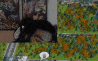 a blurry picture of a person playing a video game with a speech bubble .