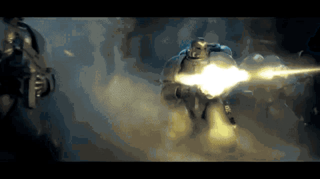 a group of soldiers are fighting each other and one of them is holding a gun