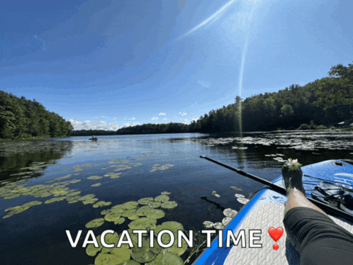 a person fishing on a lake with the words vacation time written below them