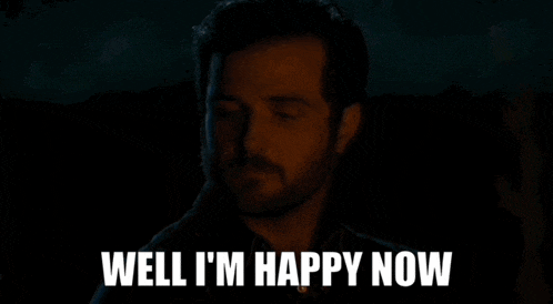 a man says well i 'm happy now in a dark room