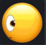 a close up of a yellow smiley face with a white eye .