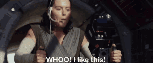 a woman wearing a headset says " whoo ! i like this "