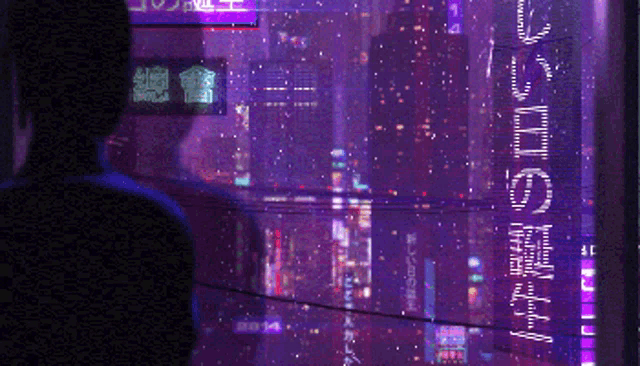 a person is looking out a window at a city skyline with a sign that says tokyo
