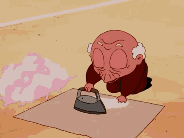 a cartoon character is ironing a piece of paper