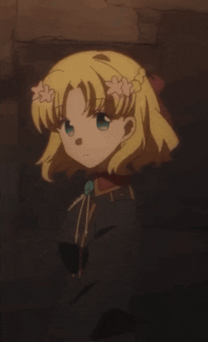 a girl with blonde hair and pink flowers on her head