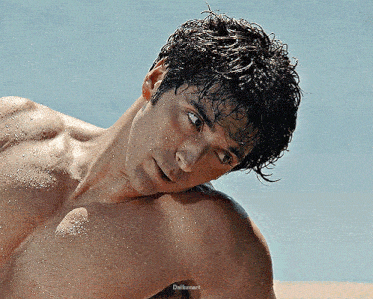 a shirtless man with water drops on his face and the words dailysunart below