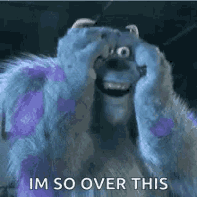 sulley from monsters inc is smiling and covering his face with his hands .