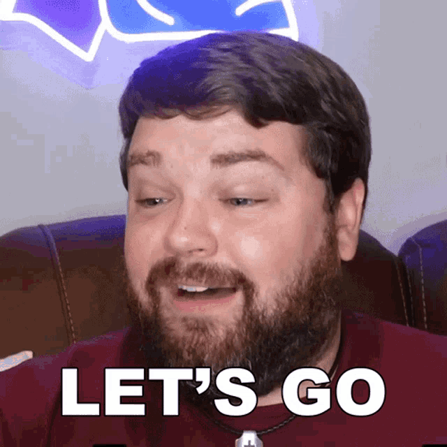 a man with a beard says " let 's go "