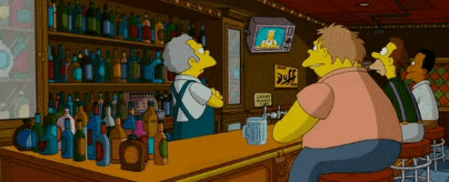 a cartoon scene with a sign that says duff