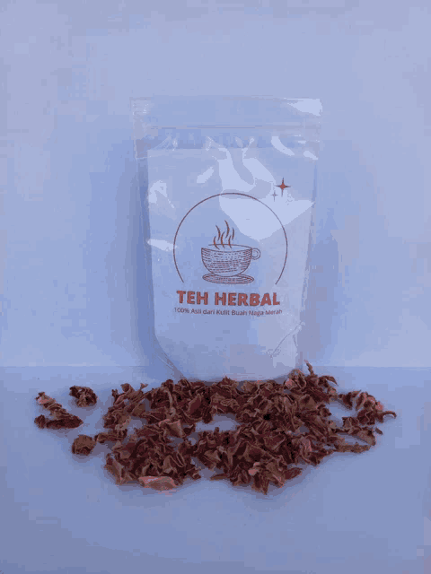 a bag of teh herbal sits on a white surface