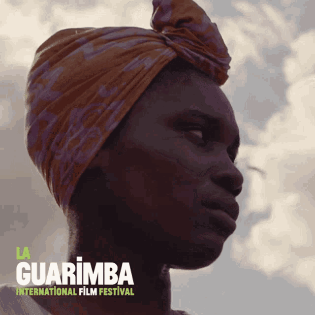 a poster for the guarimba international film festival shows a woman wearing a head scarf