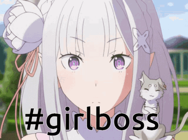 a girl holding a cat with the hashtag #girlboss on the bottom