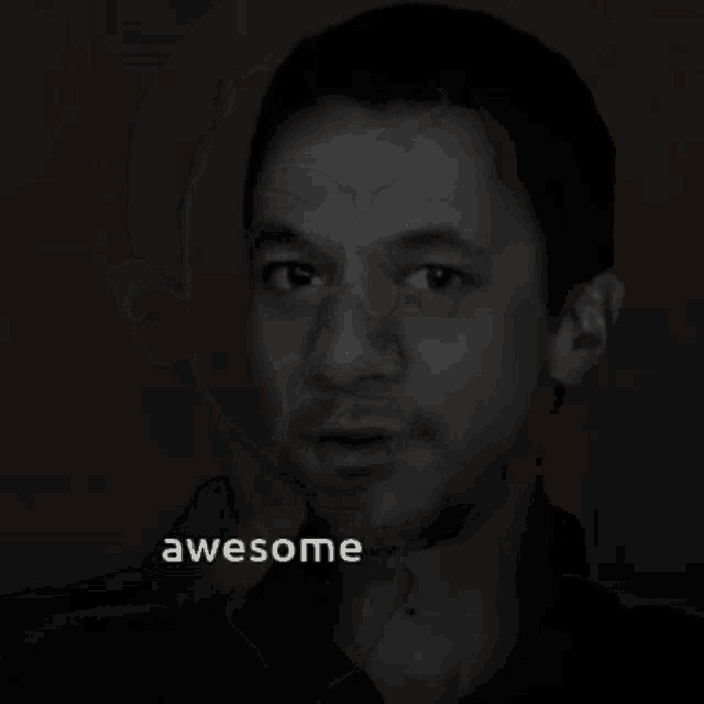 a black and white photo of a man with the word awesome written below him