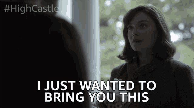 a woman says " i just wanted to bring you this " while looking at another woman